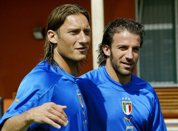 Italy-player-Francesco-Totti-L-poses-t
